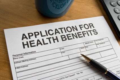 A health benefits application on a desk